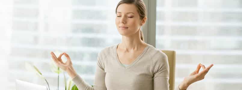 Woman meditating to cope with phentermine mood swings